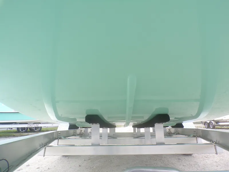 Slide: The Image of Underside view of 2025 Freedom Eagle 16 boat on trailer. - 6