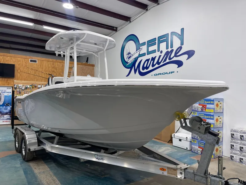 Slide: The Image of 2025 Tidewater 220LXF boat on trailer at Ocean Marine showroom. - 3