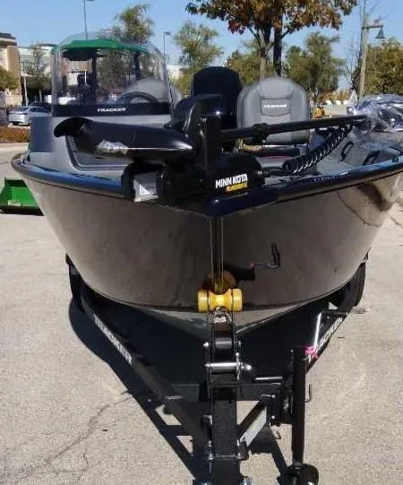 Slide: The Image of 2025 Tracker Pro Guide V-16 SC boat on trailer, featuring Minn Kota motor. - 3