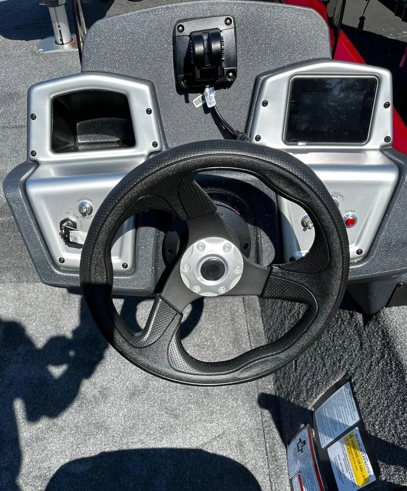 Slide: The Image of Steering console of 2025 Tracker Pro Team 175 Crappie Edition boat. - 3