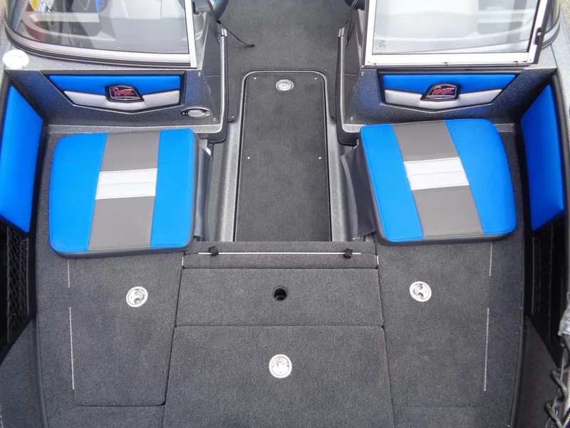 Slide: The Image of 2025 Ranger 1850MS boat interior with blue and gray seating, showcasing modern design. - 10