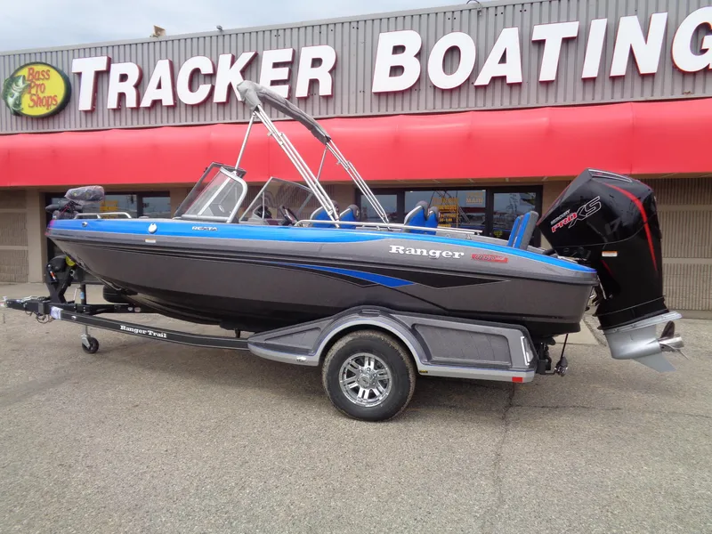 Slide: The Image of 2025 Ranger 1850MS boat displayed at Tracker Boating store. - 2