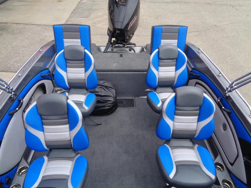 Slide: The Image of 2025 Ranger 1850MS boat interior with blue and gray seating, showcasing modern design. - 7