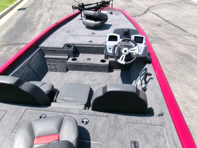 Slide: The Image of 2025 Tracker Pro Team 195 Tournament Edition boat interior with steering wheel and seating. - 4