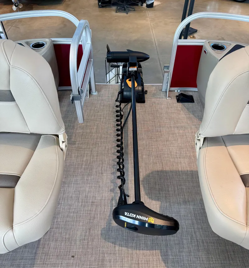 Slide: The Image of 2025 Sun Tracker Bass Buggy 18 DLX interior with Minn Kota trolling motor. - 2