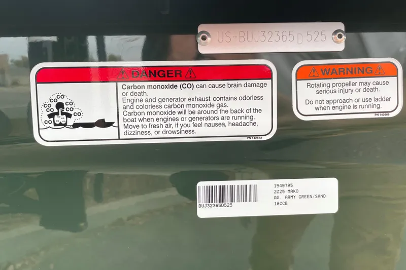 Slide: The Image of Warning labels on 2025 Mako 18 Pro Skiff Backwater Edition boat, highlighting safety hazards. - 83