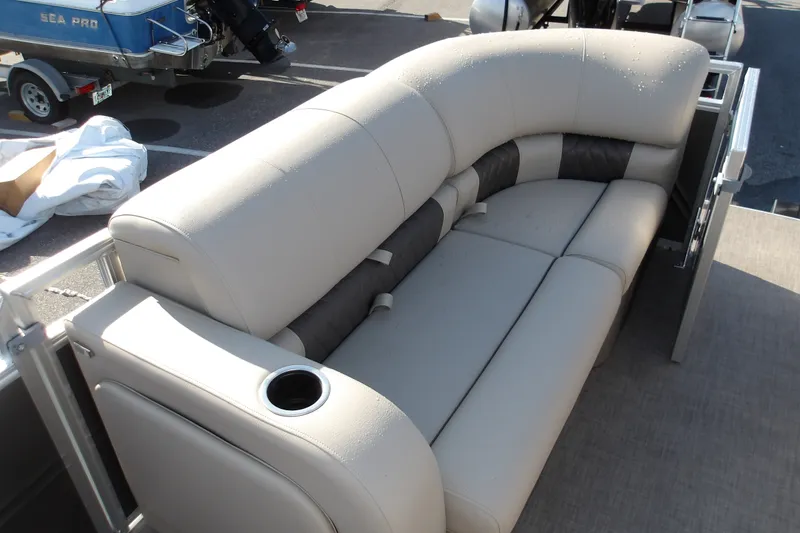 Slide: The Image of Luxurious seating on 2025 Sun Tracker Party Barge 22 RF DLX pontoon boat. - 23