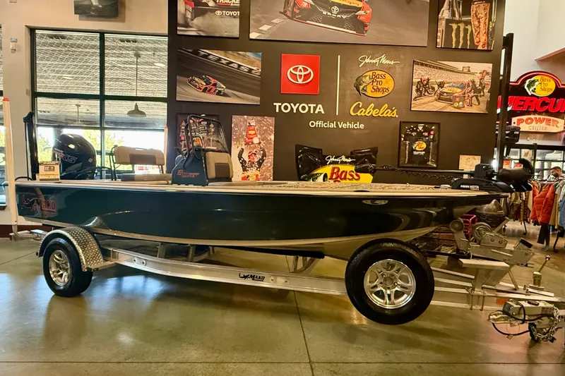 Slide: The Image of 2025 Mako 18 Pro Skiff Backwater Edition displayed indoors on a trailer. - 1
