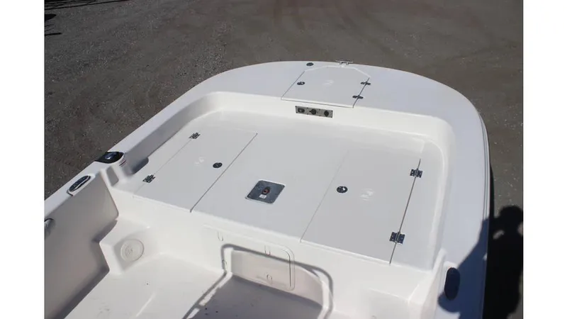 Slide: The Image of 2025 Carolina Skiff 21 LS boat deck with storage compartments. - 12