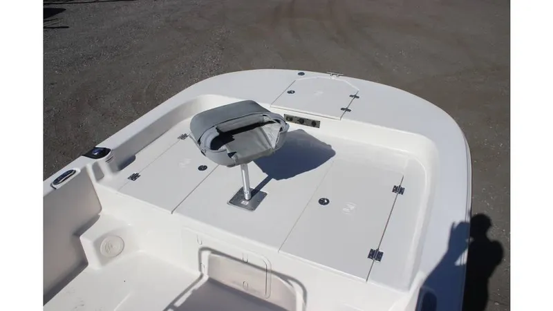 Slide: The Image of 2025 Carolina Skiff 21 LS boat deck with seating and storage compartments. - 14