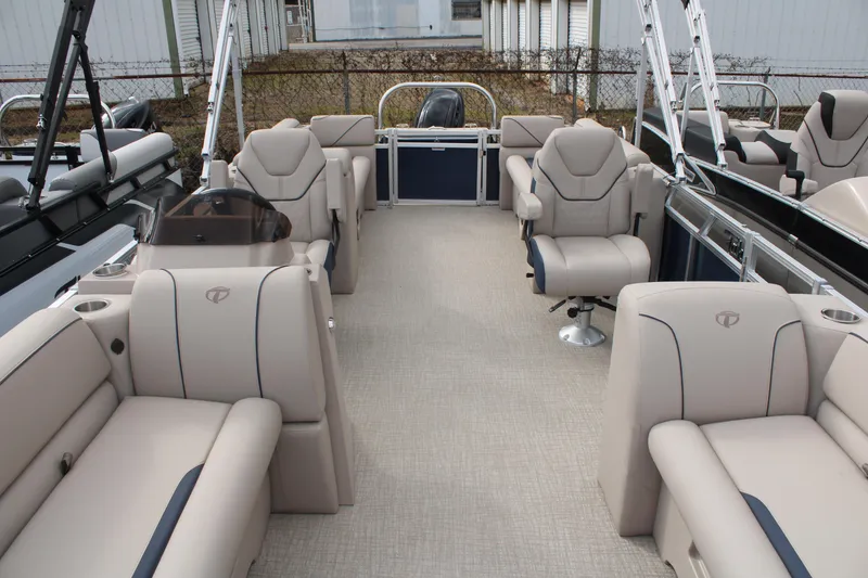 Slide: The Image of 2024 Tahoe Pontoon Sport 2385 QL interior with luxurious seating and spacious layout. - 5