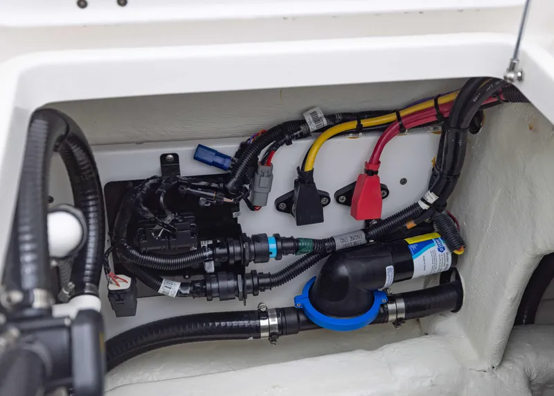 Slide: The Image of Electrical wiring and components inside a 2023 Invincible 33 Catamaran. - 41