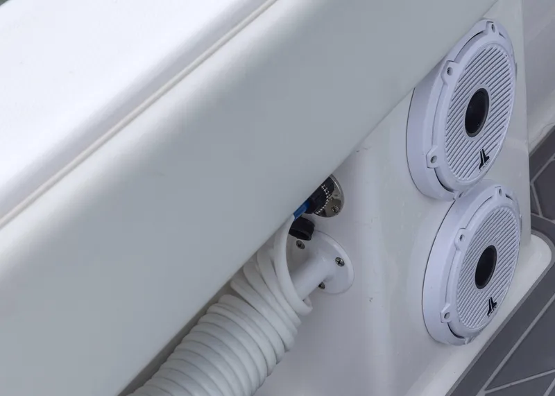 Slide: The Image of 2023 Invincible 33 Catamaran speakers and hose detail on deck. - 44