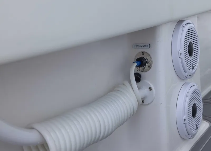 Slide: The Image of 2023 Invincible 33 Catamaran boat speakers and cable connection detail. - 45