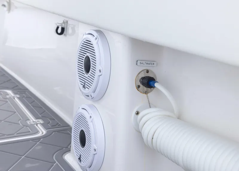 Slide: The Image of 2023 Invincible 33 Catamaran interior with speakers and hose connection. - 46