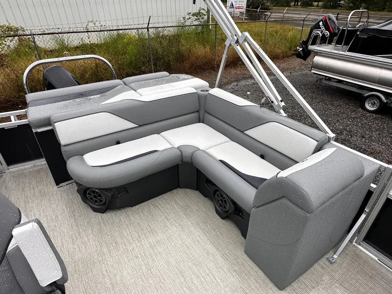 Slide: The Image of 2024 Tahoe Pontoon Sport Cruise with gray seating and modern design. - 3