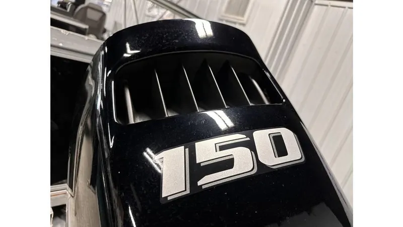 Slide: The Image of 2025 Tahoe Pontoon Sport 85 Rear Fish with 150 HP engine detail. - 13