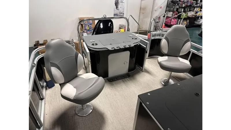 Slide: The Image of 2025 Tahoe Pontoon Sport 85 Rear Fish interior with swivel seats and fishing station. - 7