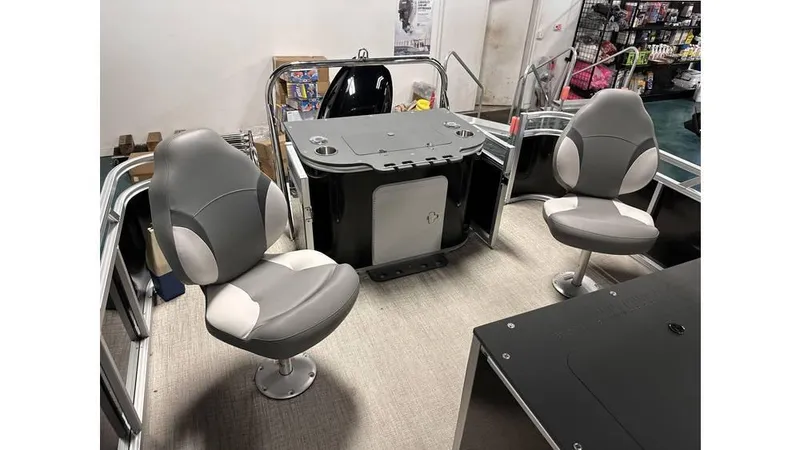 Slide: The Image of 2025 Tahoe Pontoon Sport 85 Rear Fish interior with swivel seats and fishing station. - 9