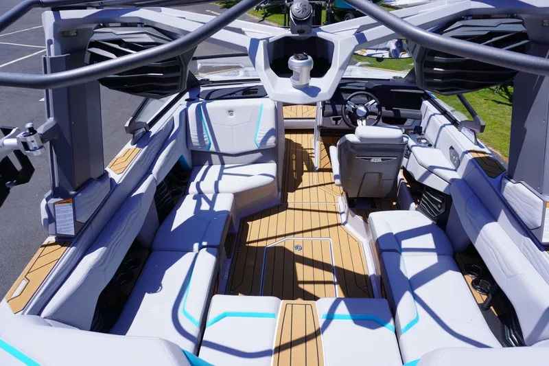 Slide: The Image of 2025 Nautique Super Air Nautique G21 boat interior with sleek seating and modern design. - 11