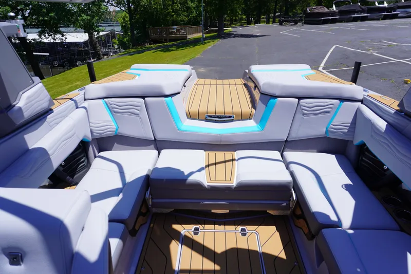Slide: The Image of 2025 Nautique Super Air Nautique G21 interior with luxurious seating and modern design. - 18