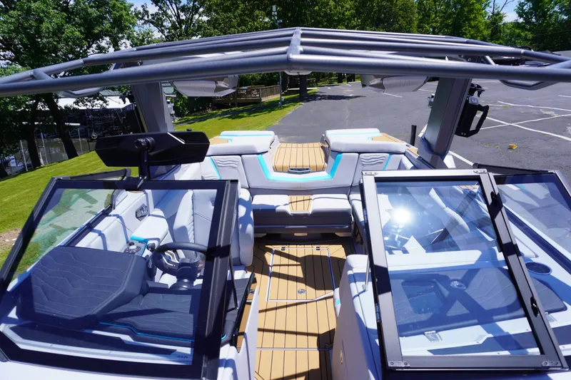 Slide: The Image of 2025 Nautique Super Air Nautique G21 interior with modern design and spacious seating. - 22