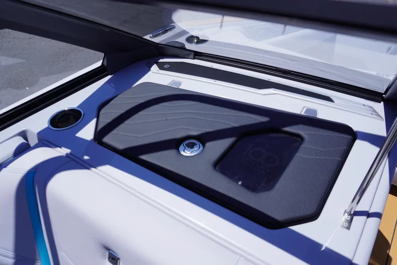 Slide: The Image of 2025 Nautique Super Air Nautique G21 boat interior with sleek dashboard design. - 24