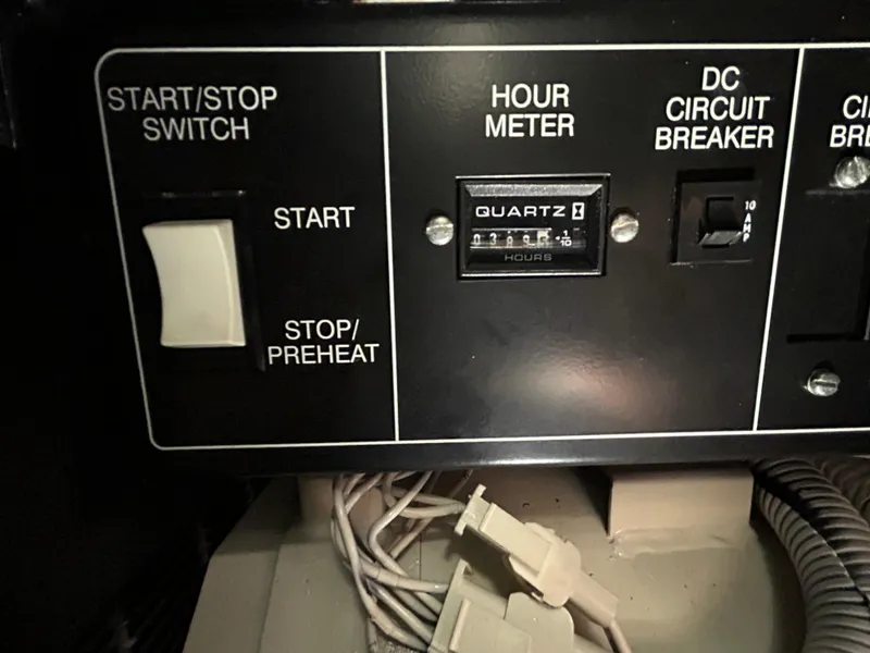 Slide: The Image of Control panel of a 2000 Riviera 34 Convertible with start switch and hour meter. - 41