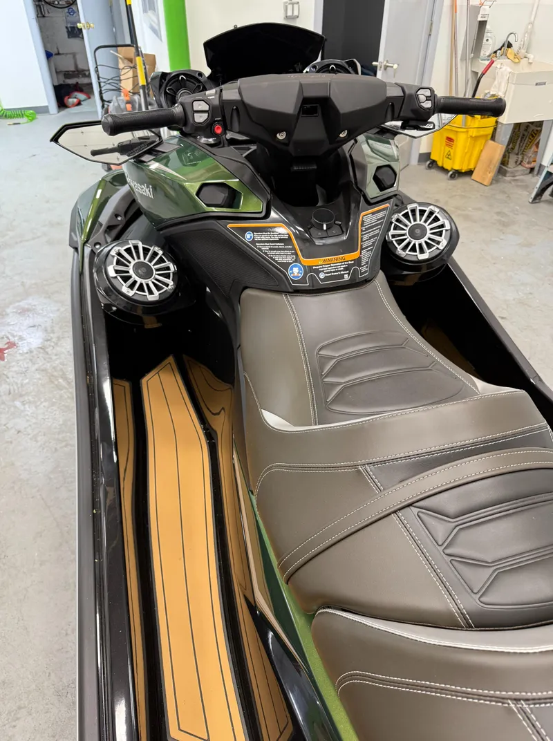 Slide: The Image of 2025 Kawasaki ULTRA 160 LX jet ski with sleek design and advanced controls. - 3