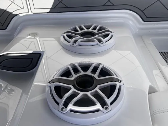 Slide: The Image of 2022 Nor-Tech 390 Sport Center Console speakers on deck, showcasing modern marine audio design. - 20