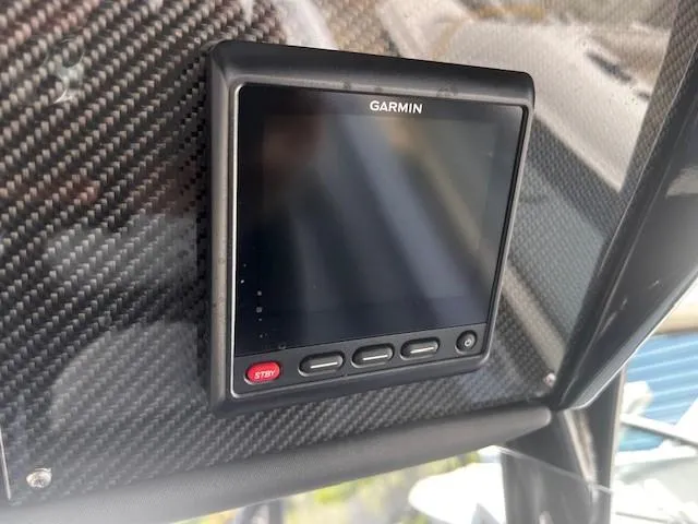 Slide: The Image of Garmin display on 2022 Nor-Tech 390 Sport Center Console, carbon fiber background. - 4