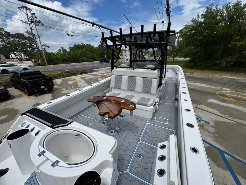 Slide: The Image of 2022 Invincible 33 Catamaran with spacious deck, seating, and fishing amenities. - 44