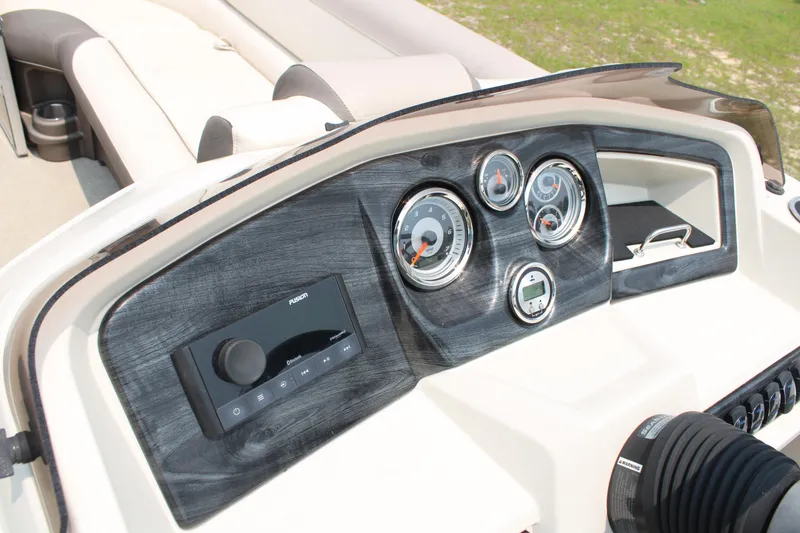 Slide: The Image of Dashboard of 2021 Tahoe LTZ Cruise boat with gauges and controls. - 11