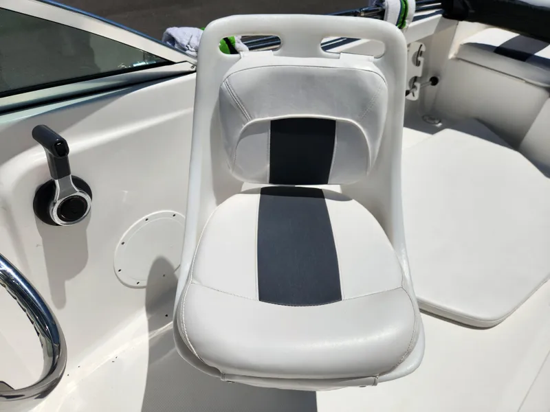 Slide: The Image of White and black boat seat on a 2014 Tidewater 196 DC. - 13