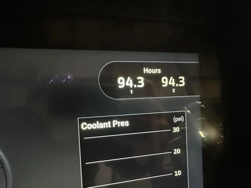 Slide: The Image of Display panel showing engine hours and coolant pressure for MTI 340X, 2018 model. - 15