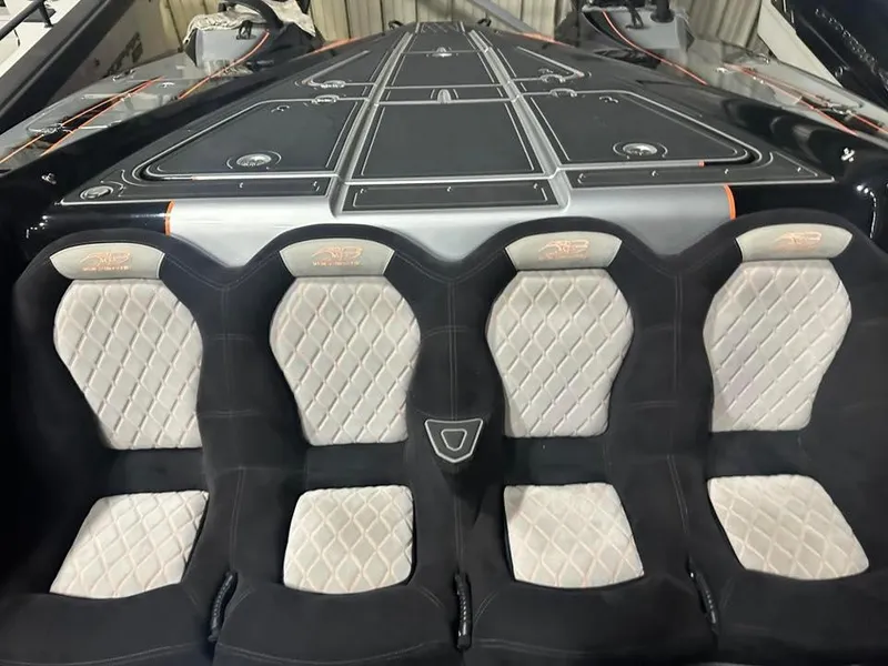Slide: The Image of 2018 MTI 340X boat interior with four quilted seats. - 21
