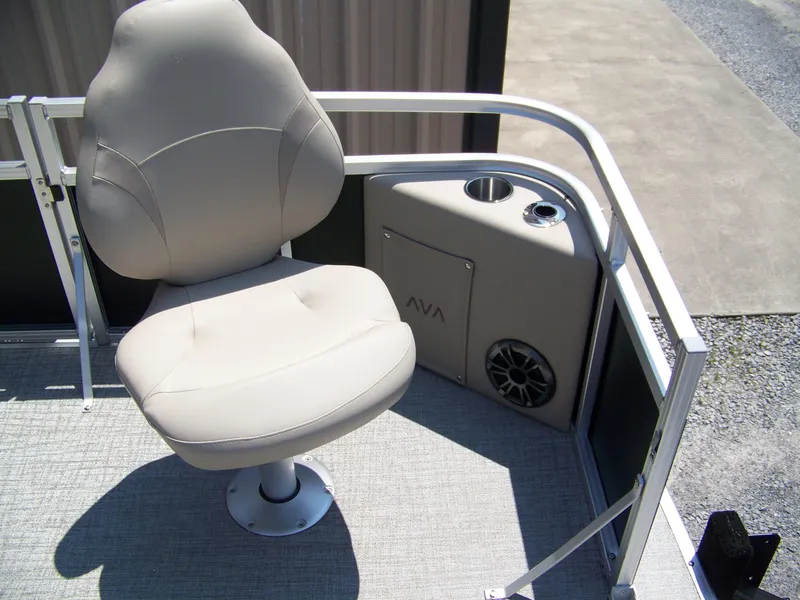 Slide: The Image of Luxurious seating on 2025 Avalon VTX Quad Fish boat with cup holder and speaker. - 14