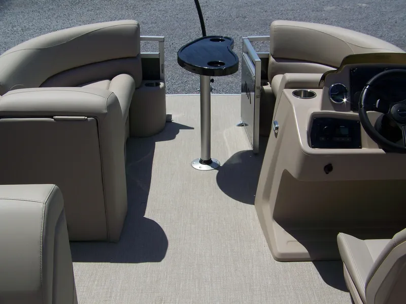 Slide: The Image of 2025 Avalon VLS Quad Lounge interior with beige seating and sleek control panel. - 12