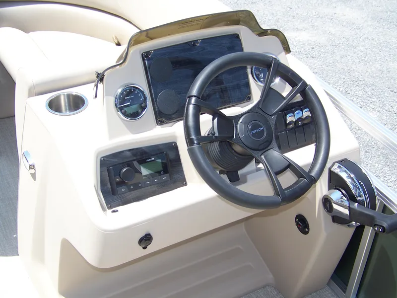 Slide: The Image of 2025 Avalon VLS Quad Lounge dashboard with steering wheel and controls. - 7