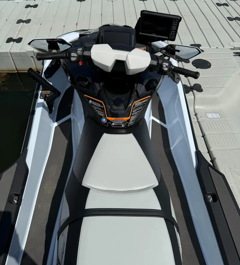 Slide: The Image of 2025 Kawasaki Ultra 160LX-S Angler jet ski docked, featuring advanced controls and sleek design. - 5
