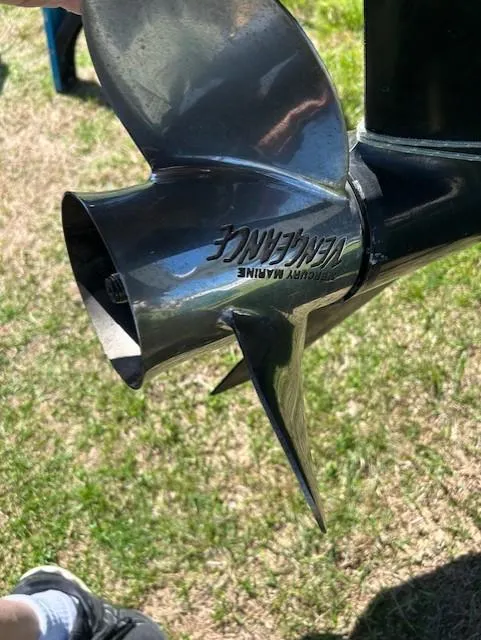 Slide: The Image of Close-up of a boat propeller on a 2003 Aquasport 250 Osprey. - 3