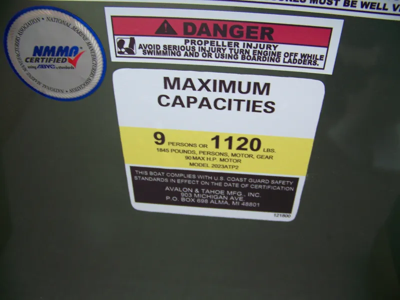 Slide: The Image of 2025 Avalon Venture Rear Fish capacity label: 9 persons or 1120 lbs, NMMA certified. - 10