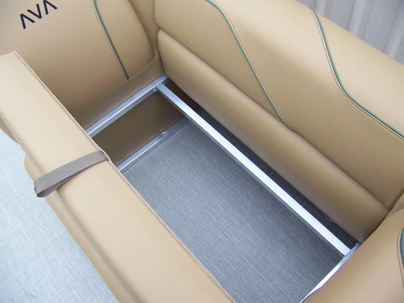 Slide: The Image of 2025 Avalon Venture Rear Fish boat seat with tan upholstery and storage compartment. - 7