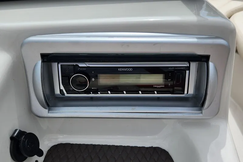 Slide: The Image of Kenwood stereo system in 2013 Tahoe Q5i boat dashboard. - 12