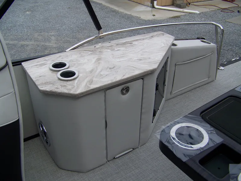 Slide: The Image of 2025 Avalon Catalina Cruise boat interior with marble countertop and cup holders. - 11