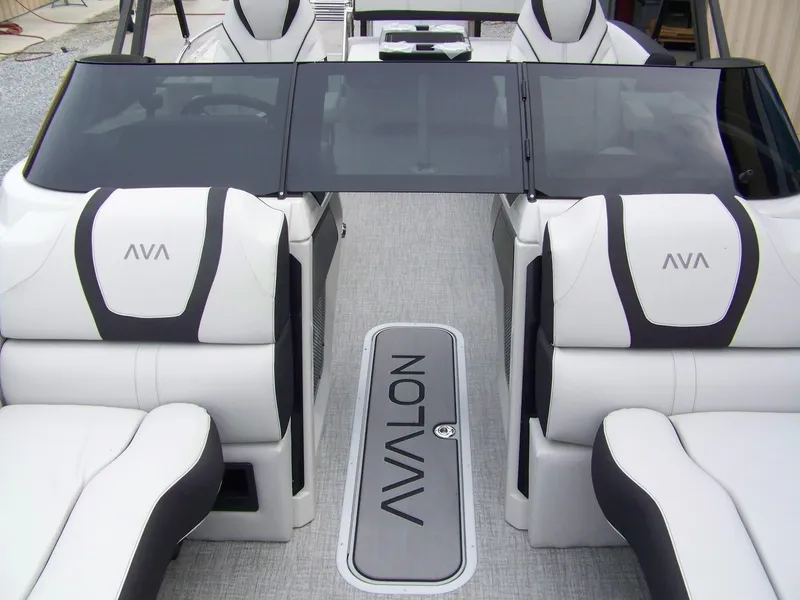 Slide: The Image of 2025 Avalon Catalina Cruise Rear Bench Windshield with sleek white and black seating design. - 3