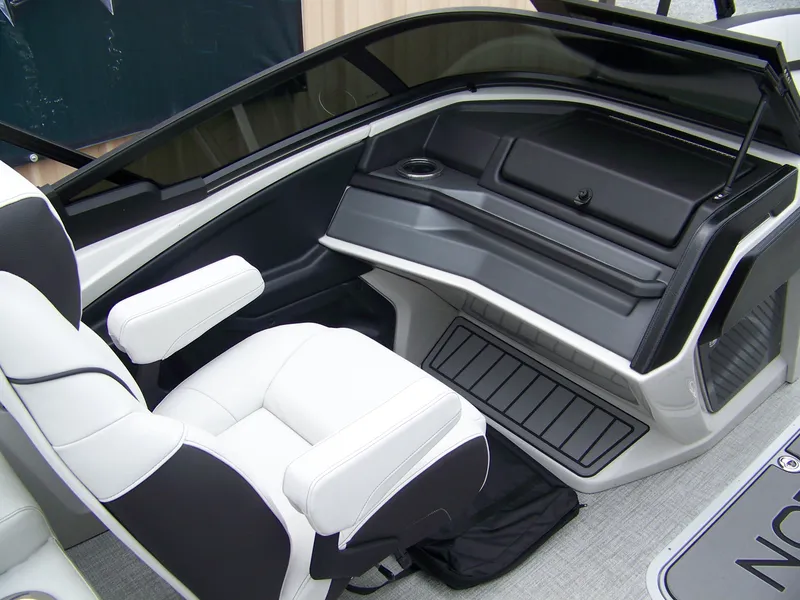 Slide: The Image of 2025 Avalon Catalina Cruise interior with white seating and sleek dashboard design. - 9