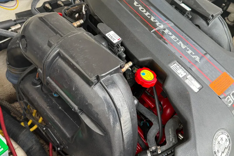 Slide: The Image of Volvo Penta engine in a 2015 Chaparral 244 Sunesta boat. - 14