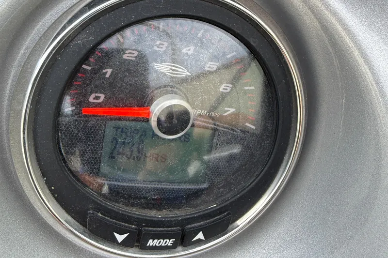 Slide: The Image of Tachometer of 2015 Chaparral 244 Sunesta boat displaying RPM and hours. - 19