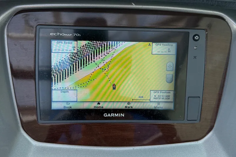Slide: The Image of Garmin GPS display on 2015 Chaparral 244 Sunesta boat dashboard. - 21